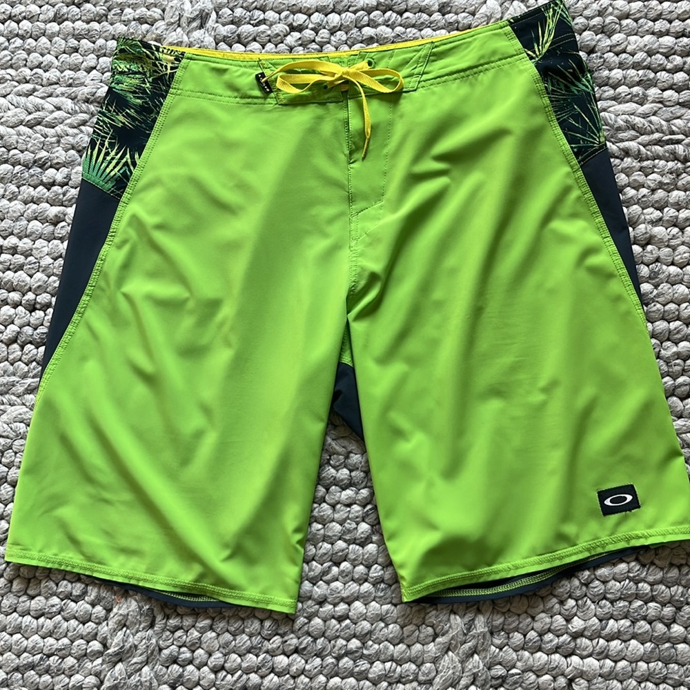 Oakley fluorescent green and gray tropical print board shorts